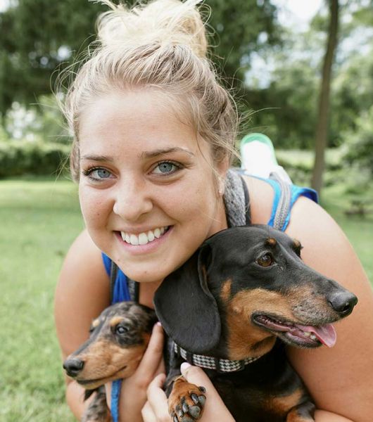 Pet Owner Hugging Pets